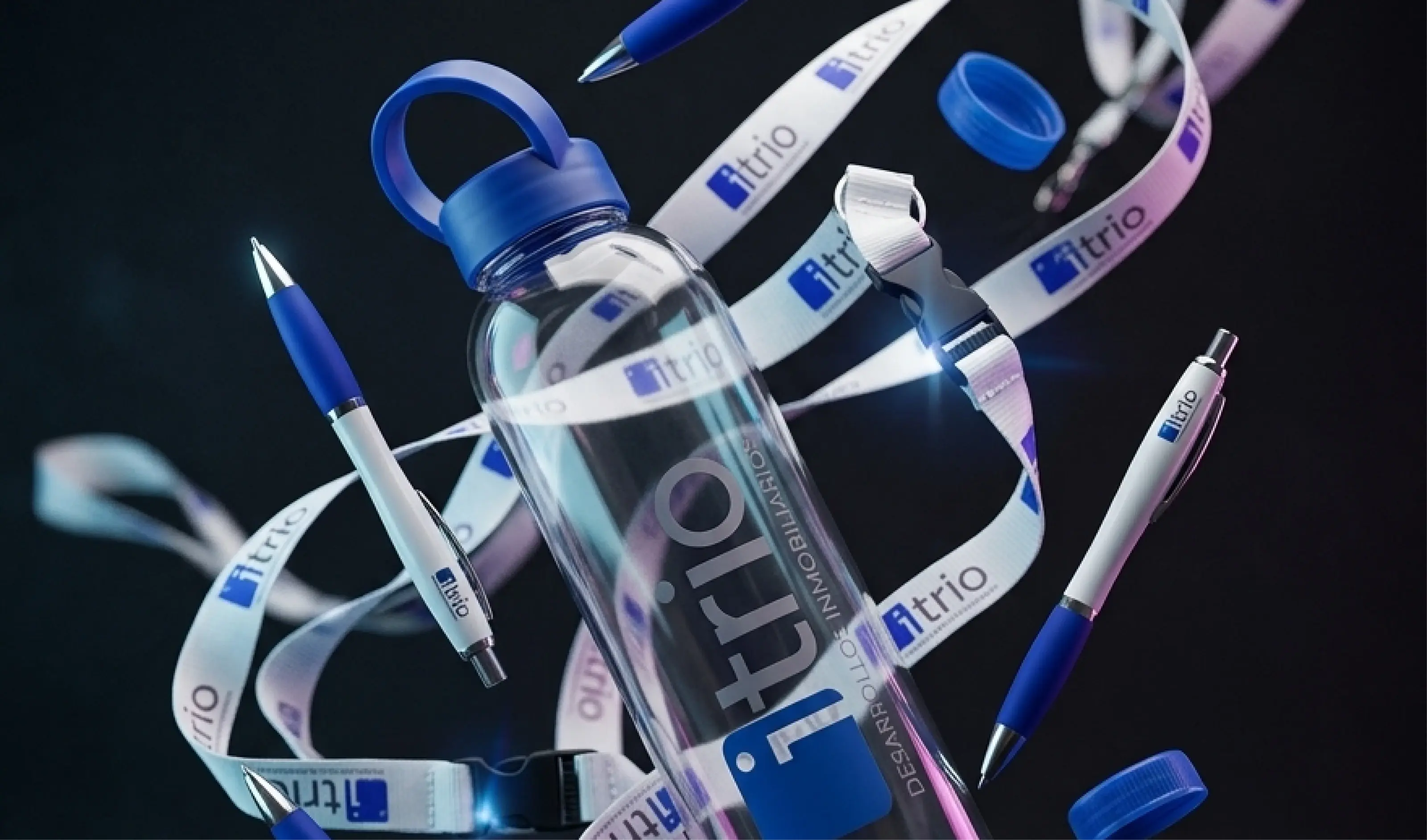 Botella, lápices y lanyards personalizados con marca corporativa